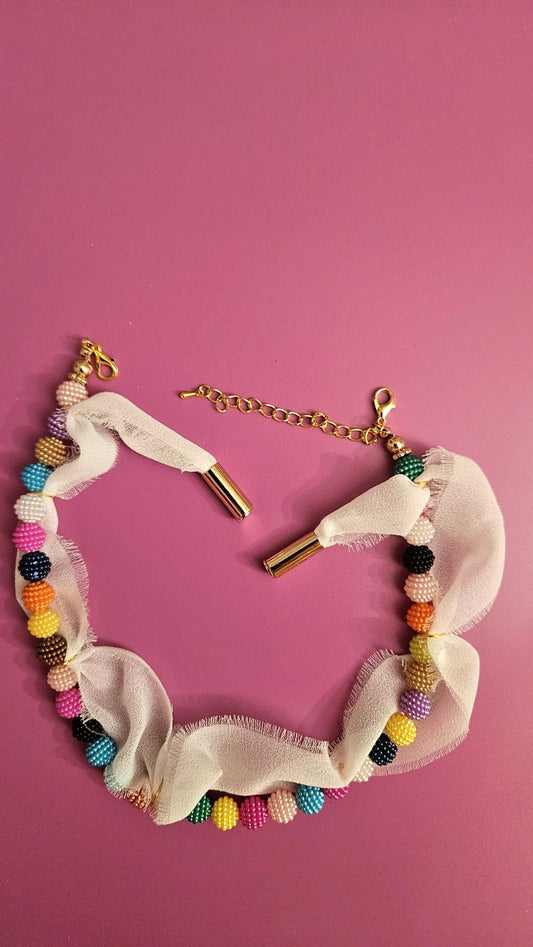 Sweather necklace "Spring pompoms"